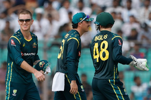 Australia’s Adam Zampa (left) celebrates the wicket of Bangladesh’s Shoriful Islam.
