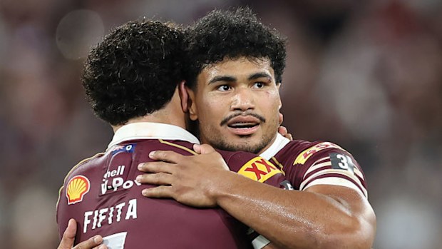 Jojo Fifita and Robert Toia embrace at full time.