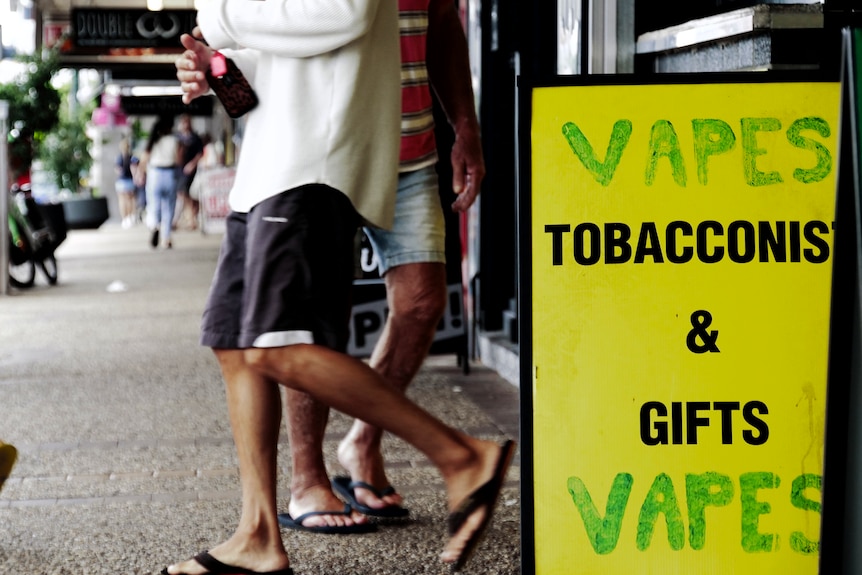 A makeshift sign advertising vapes.