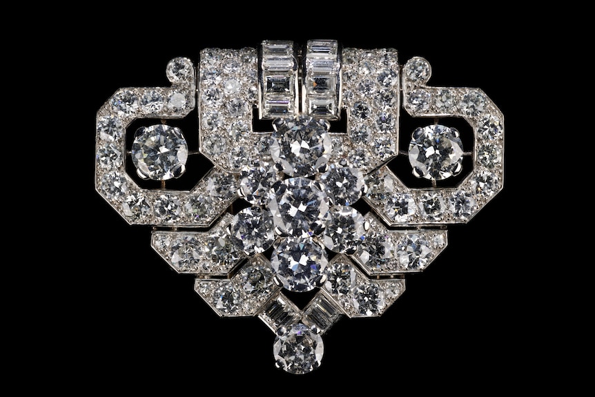 A late art deco Cartier brooch featuring diamonds and platinum