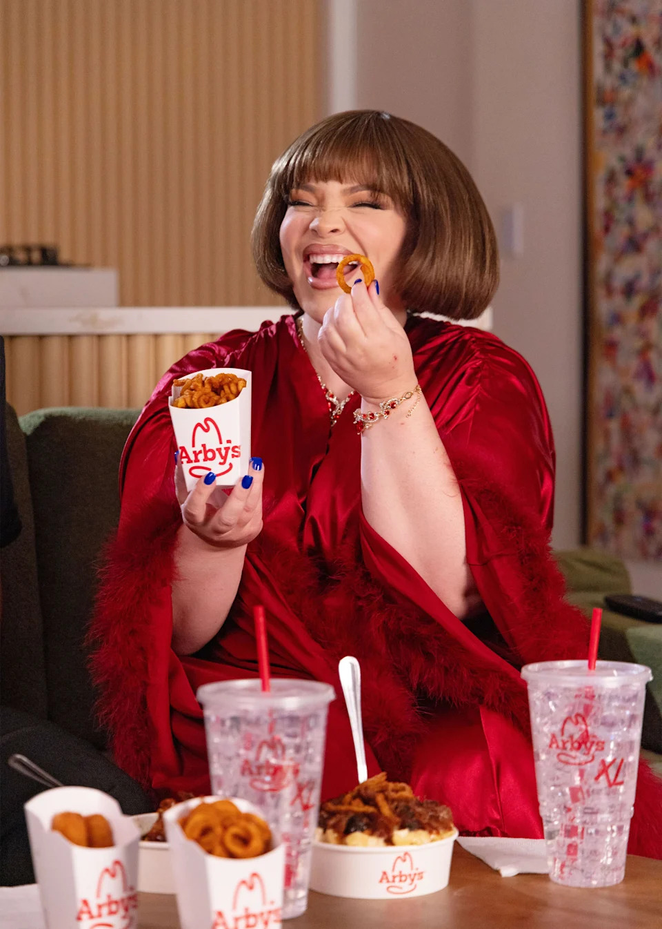 Trisha Paytas became known for her ”mukbang” videos, in which she would eat large portions of food. Pictured here in May 2026 in Los Angeles. / Sara Jaye/Getty Images for Arby's