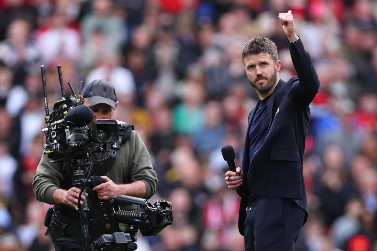 Manchester United head coach / manager Michael Carrick speaks to the fans at full time during the Premier League match between Manchester United and Nottingham Forest