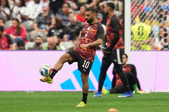 Mo Salah warms up.