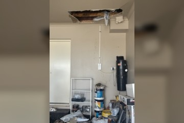 A damaged ceiling in a garage