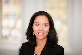 A woman smiling to camera