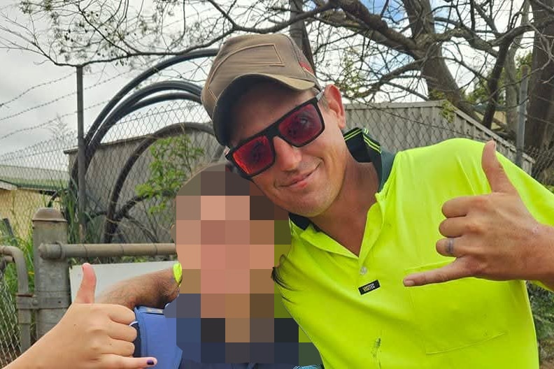 Chris Duke wearing a hi-vis yellow shirt and sunglasses