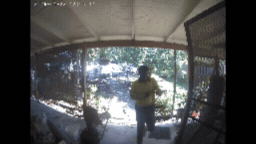 CCTV footage appears to show a man in an Australia Post uniform walking to the door without a parcel, taking a photo and leaving.