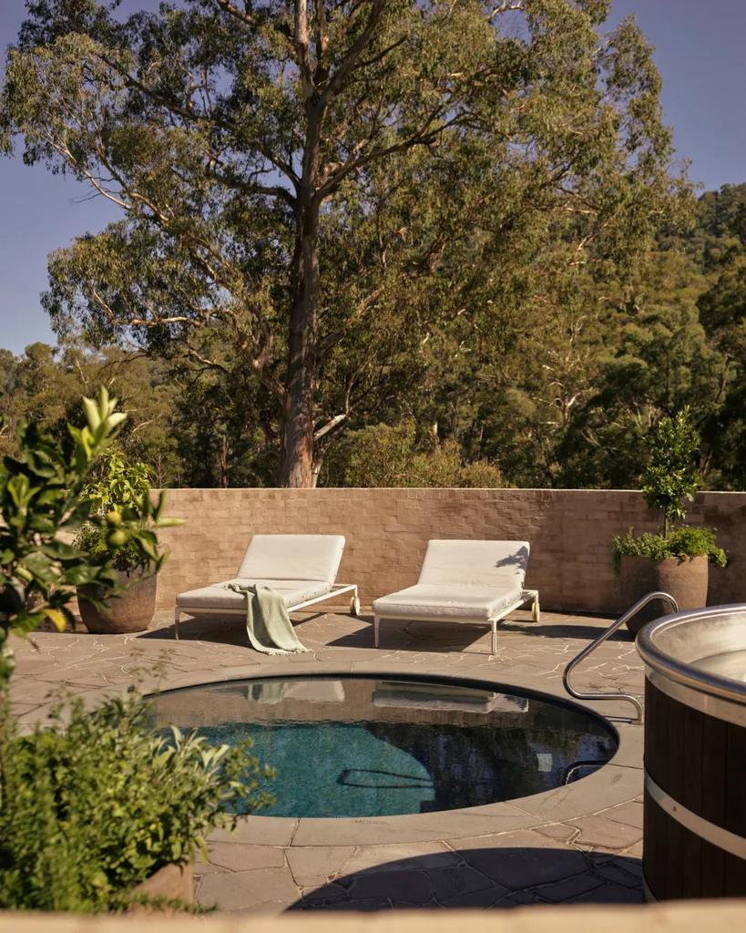 Sunloungers sit beside the sundrenched plunge pool.