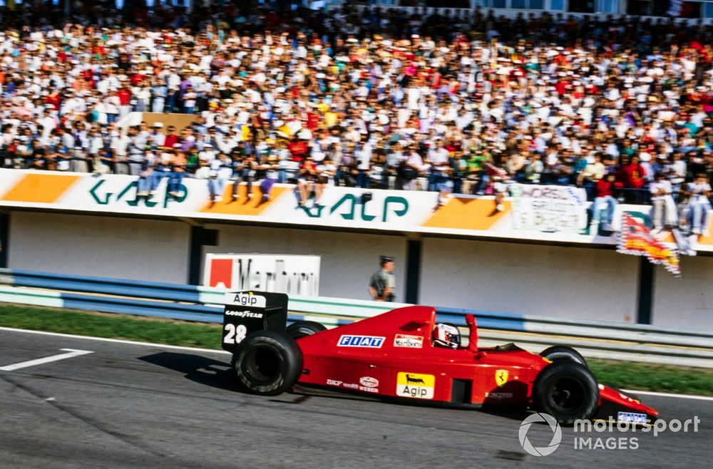 Berger celebrates victory in Portugal in 1989 - one of only three race finishes he made that year