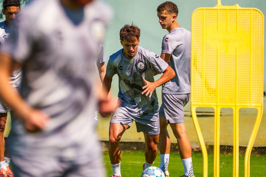 Jesus De Vicente of the Oakland Roots soccer club dribbles a ball during training in Oakland