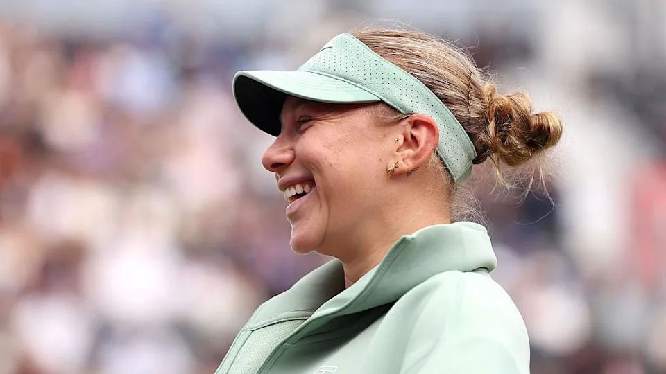 Amanda Anisimova of United States reacts following victory over Laura Siegemund