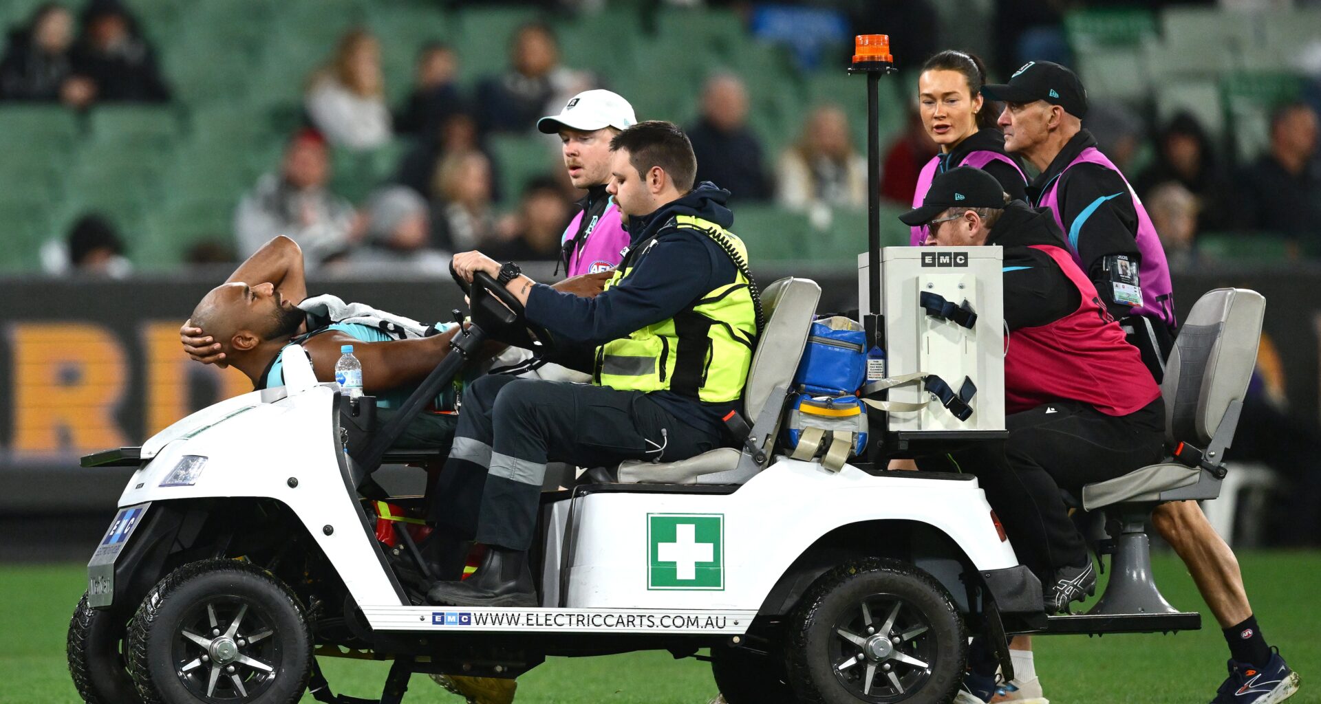 Key defender in hospital as trio of injuries rock Power, win eases Pies' tension