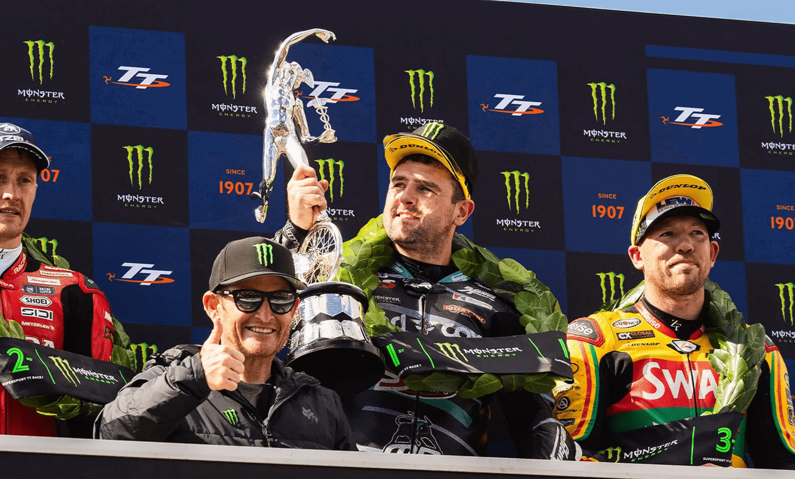 Michael Dunlop, Dean Harrison, Peter Hickman, Ricky Carmichael on 2026 Isle of Man TT Supersport Race 1 podium. Credit: Isle of Man TT.