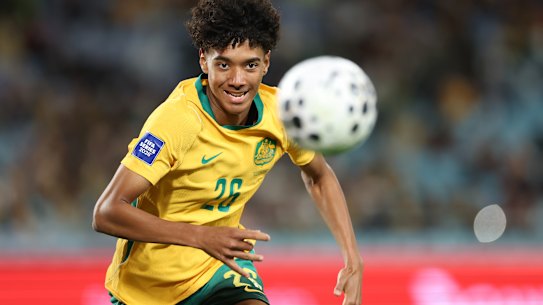 Lucas Herrington chases the ball on international debut.