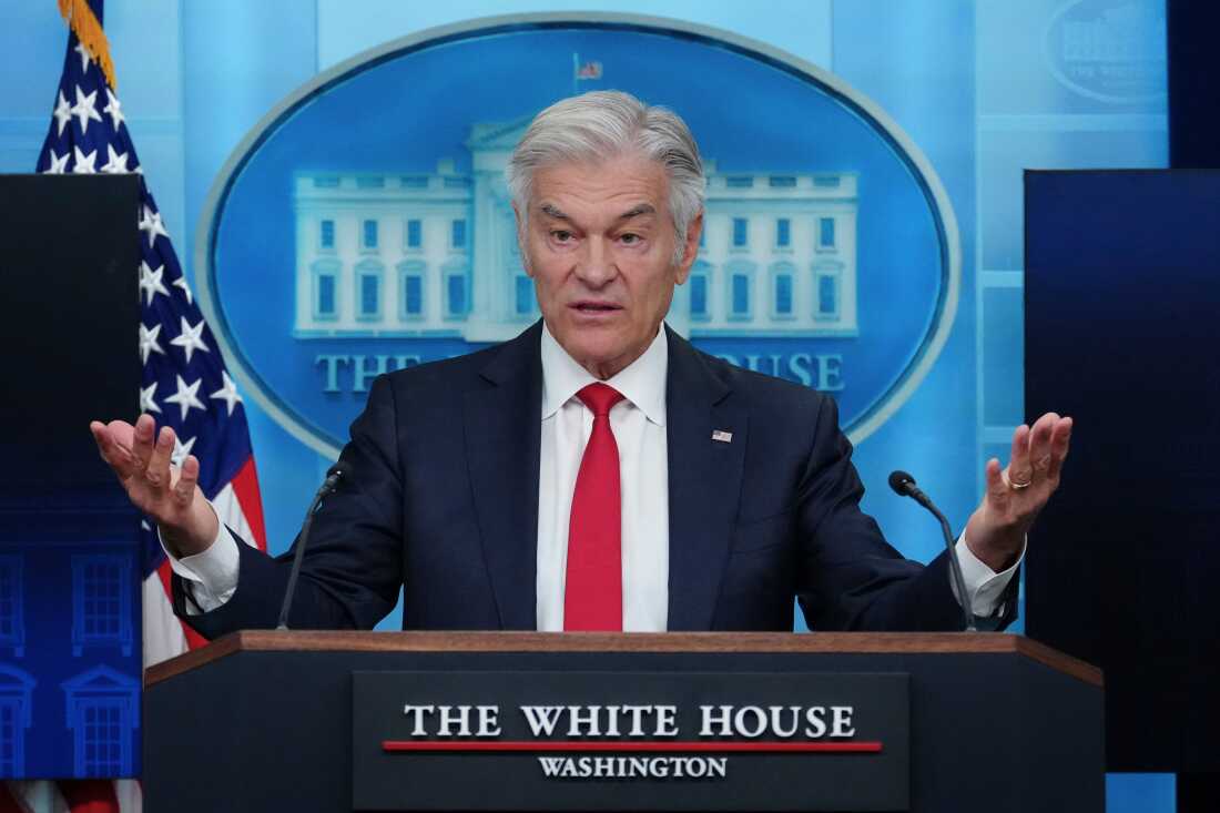 Dr. Mehmet Oz is seen at a podium that says "The White House."