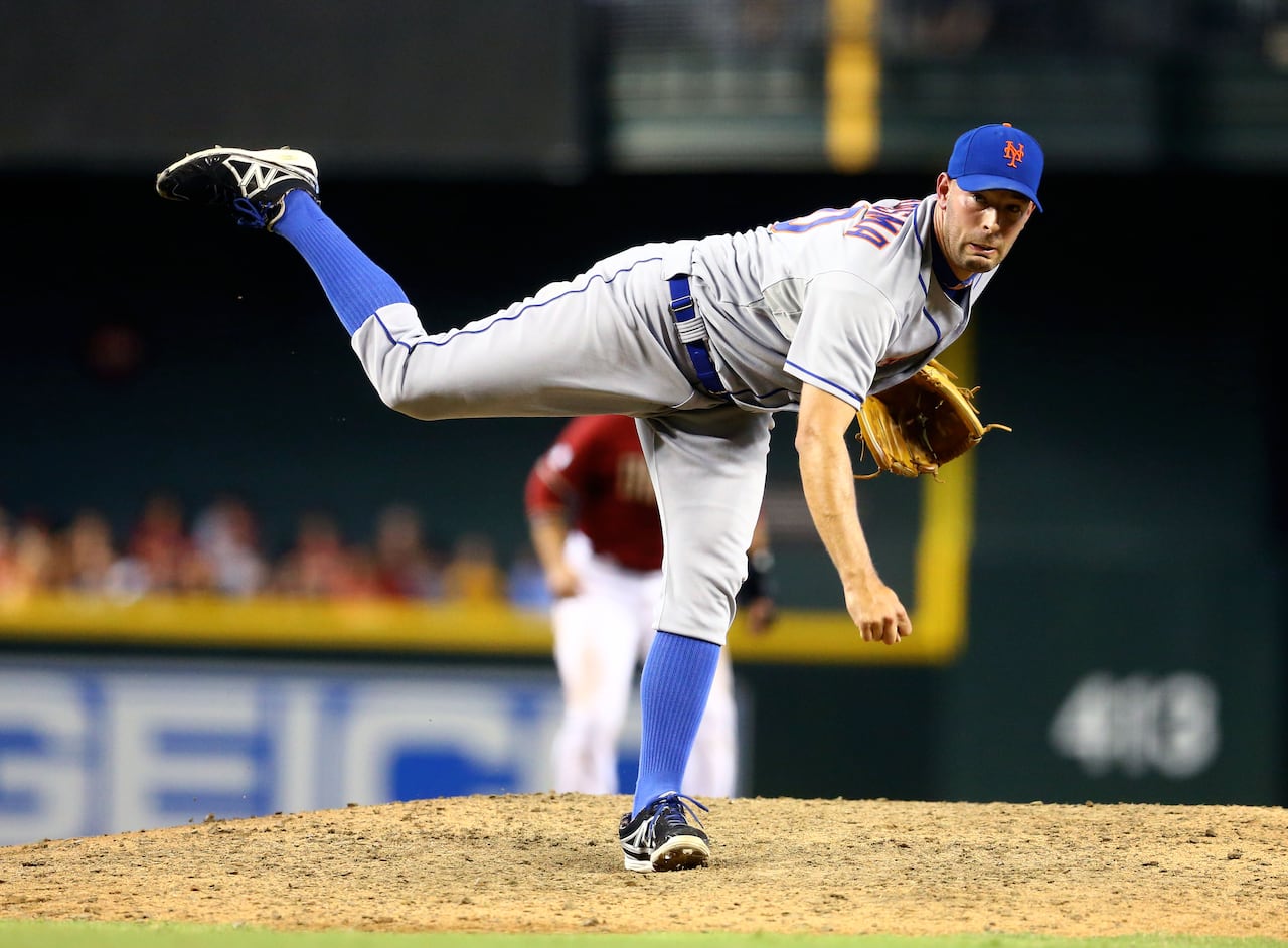 Pitcher David Aardsma is seen at the end of his delivery, after throwing a pitch from the mound, during a 2013 MLB game.