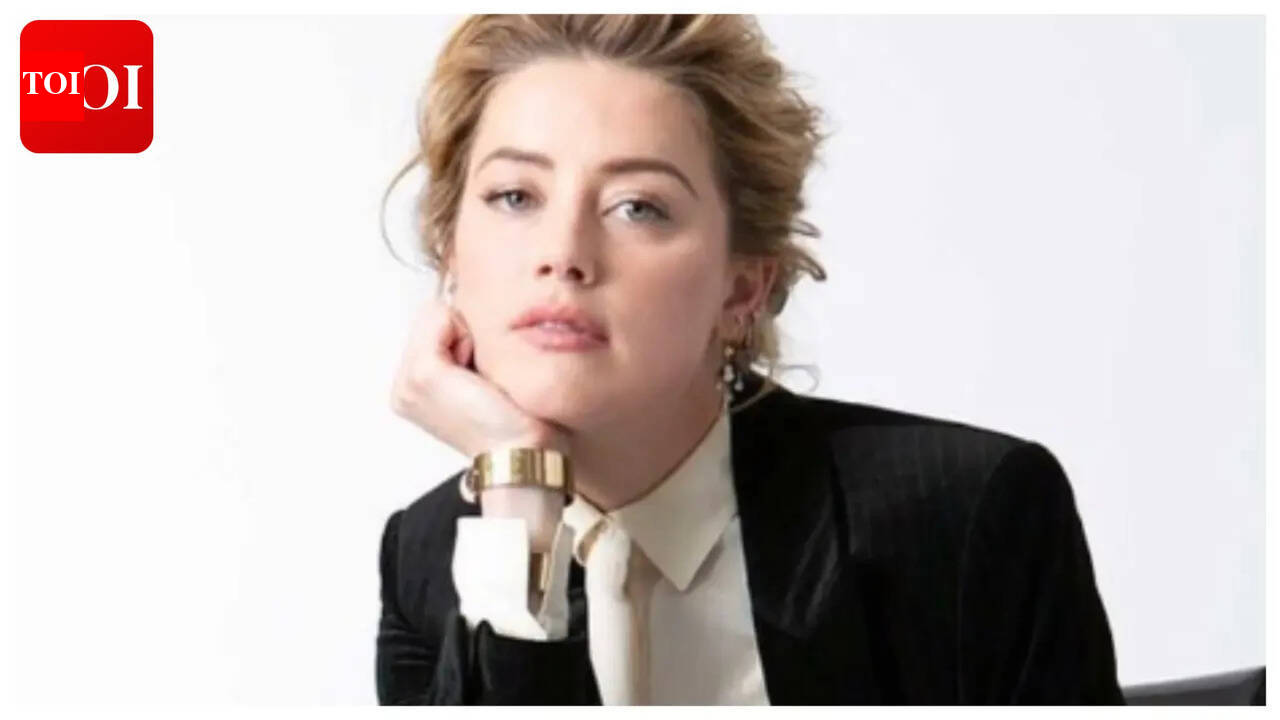 Amber Heard makes rare appearance with daughter while cycling in Madrid - PICS |