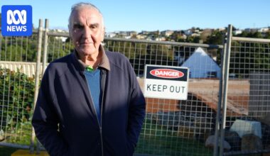 Neighbours say excavations from a public housing project have caused their land to start slipping