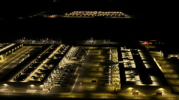 Amazon Web Services data center is visible at night Aug. 22, 2024, in Boardman, Ore. (AP Photo/Jenny Kane, File)