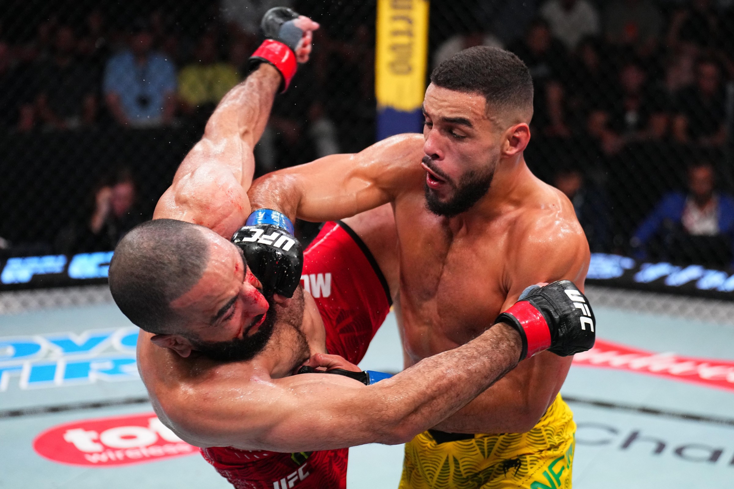 LAS VEGAS, NEVADA - JUNE 06: (R-L) Gabriel Bonfim of Brazil punches Belal Muhammad in a welterweight fight during the UFC Fight Night event at Meta APEX on June 06, 2026 in Las Vegas, Nevada. (Photo by Chris Unger/Zuffa LLC)