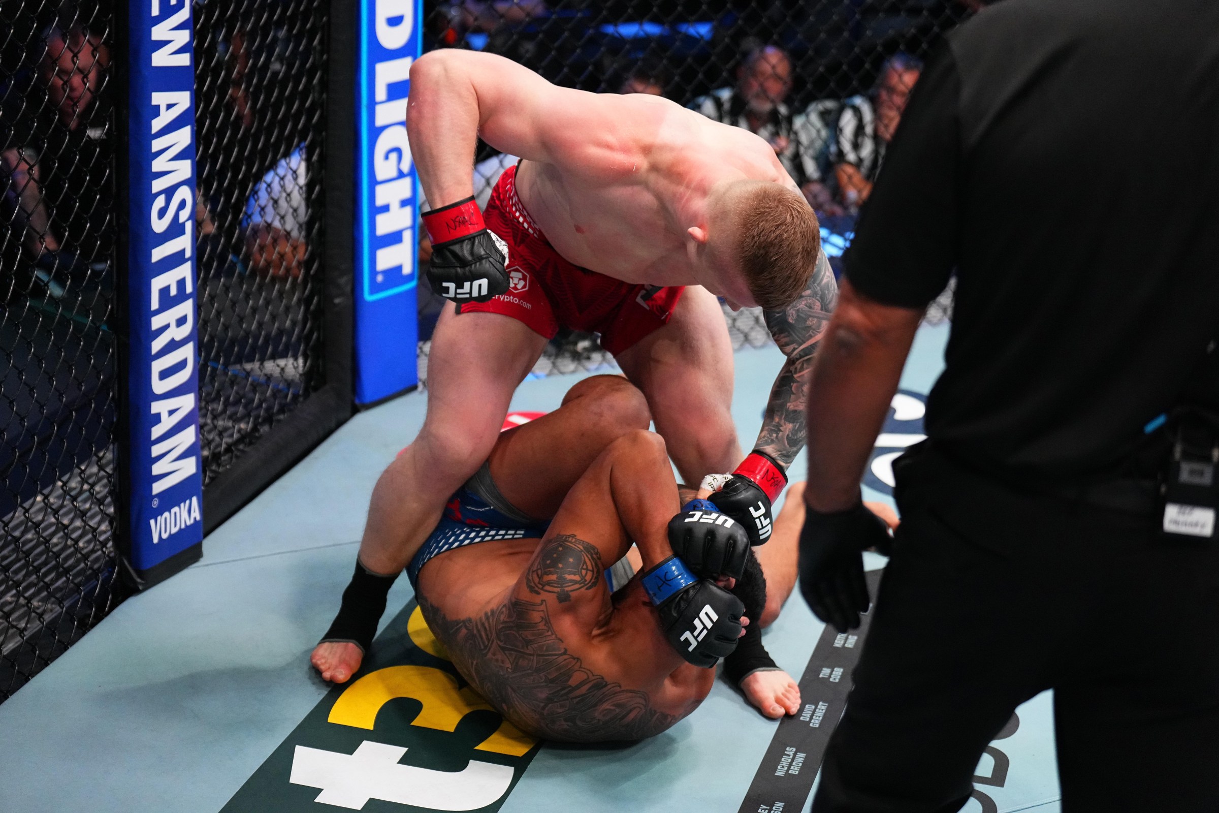 LAS VEGAS, NEVADA - JUNE 06: (L-R) Iwo Baraniewski of Poland punches Junior Tafa of Australia in a light heavyweight fight during the UFC Fight Night event at Meta APEX on June 06, 2026 in Las Vegas, Nevada. (Photo by Chris Unger/Zuffa LLC)