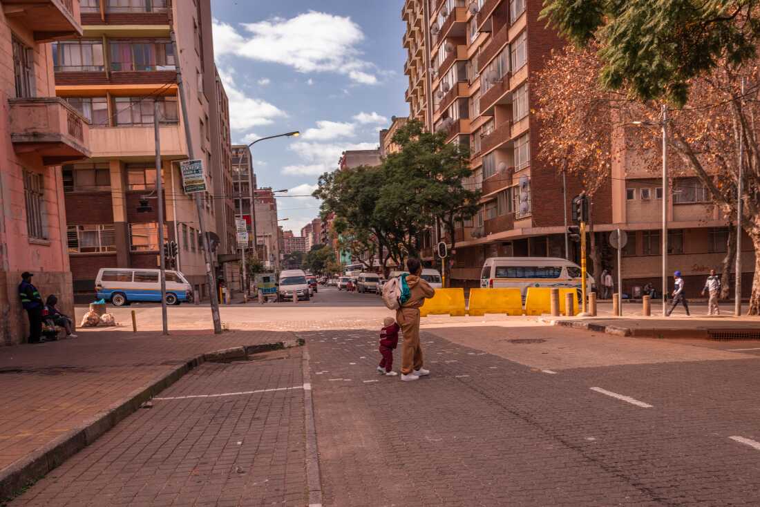 Passersby outside the WITS RHI Women’s Health Clinic in Esselen street, Hillbrow, Johannesburg, South Africa on May 25, 2026.
