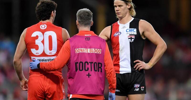 Tom De Koning showed his concern when Sydney's Tom McCartin left the field after a head knock.  Photo: Steven Markham/AAP PHOTOS