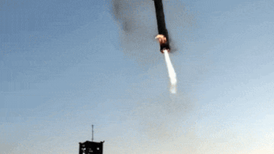 SpaceX’s mega rocket booster returns to the launch pad.