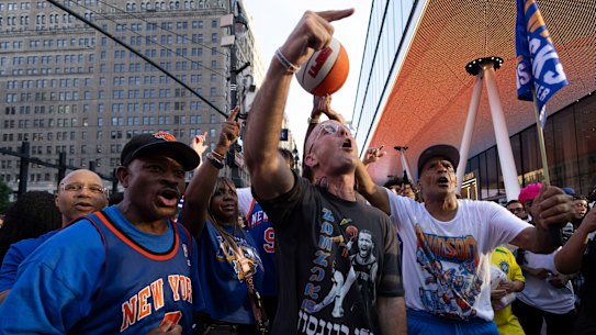 Brooklyn Rapper Kosha Dillz performs with New York Knicks fans outside Madison Square Garden.