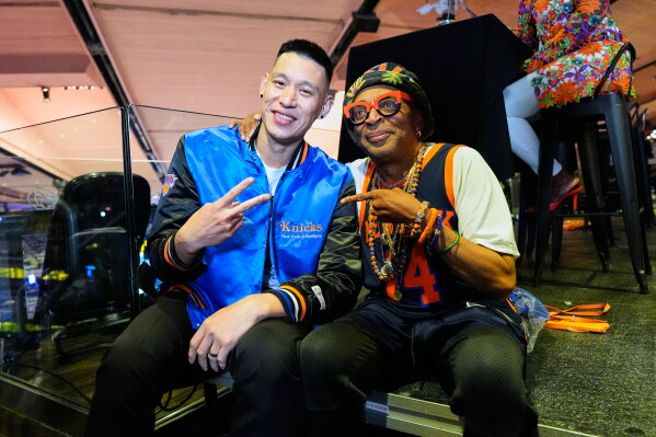Former NBA player Jeremy Lin, left, and filmmaker Spike Lee pose for a photo prior to Game 3 of the NBA Finals basketball series between the San Antonio Spurs and the New York Knicks, Monday, June 8, 2026, in New York. (AP Photo/Yuki Iwamura)