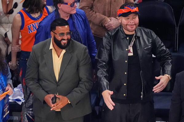 DJ Khaled, left, and Fat Joe arrive prior to Game 3 of the NBA Finals basketball series between the San Antonio Spurs and the New York Knicks, Monday, June 8, 2026, in New York. (AP Photo/Yuki Iwamura)