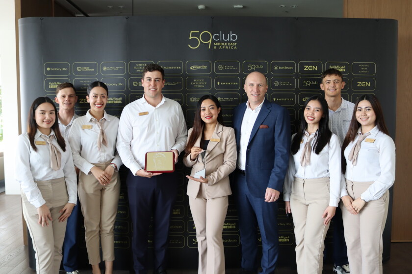 Al Zorah Team with Awards.JPG