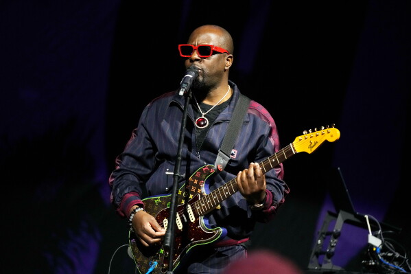 Singer and activist Wyclef Jean performs after a WNBA basketball game between the Phoenix Mercury and the Chicago Sky on May 21, 2023, in Phoenix. (AP Photo/Ross D. Franklin, file)