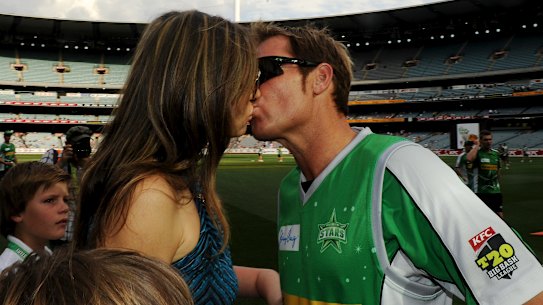 Warne and Liz Hurley at the MCG.