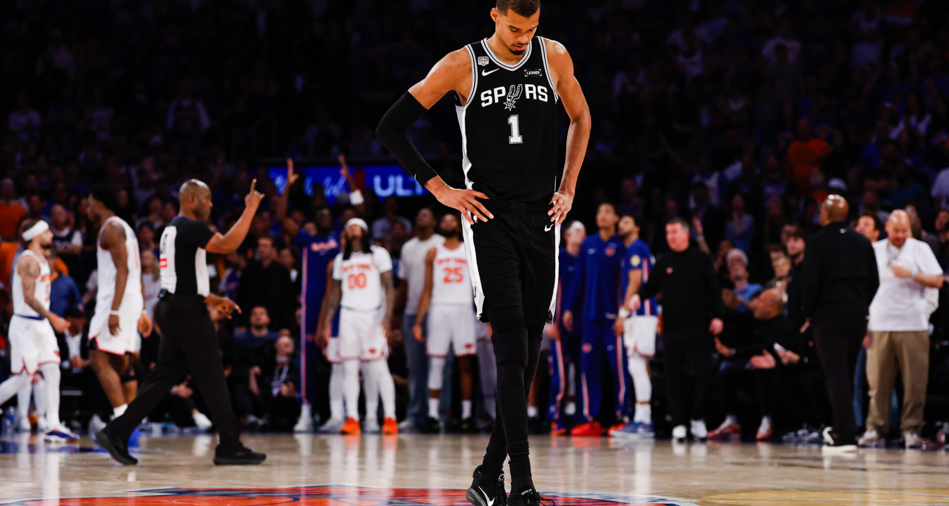 San Antonio Spurs center Victor Wembanyama (1) looks down toward the court during the fourth quarter of Game 4 of the NBA Finals at Madison Square Garden in New York, Wednesday, June 10, 2026. The Knicks defeated the Spurs 107-106, leading the series 3-1.