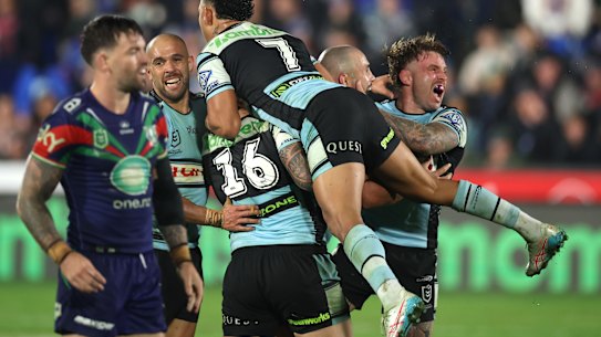 The Sharks celebrate Braydon Trindall’s match-winning field goal.
