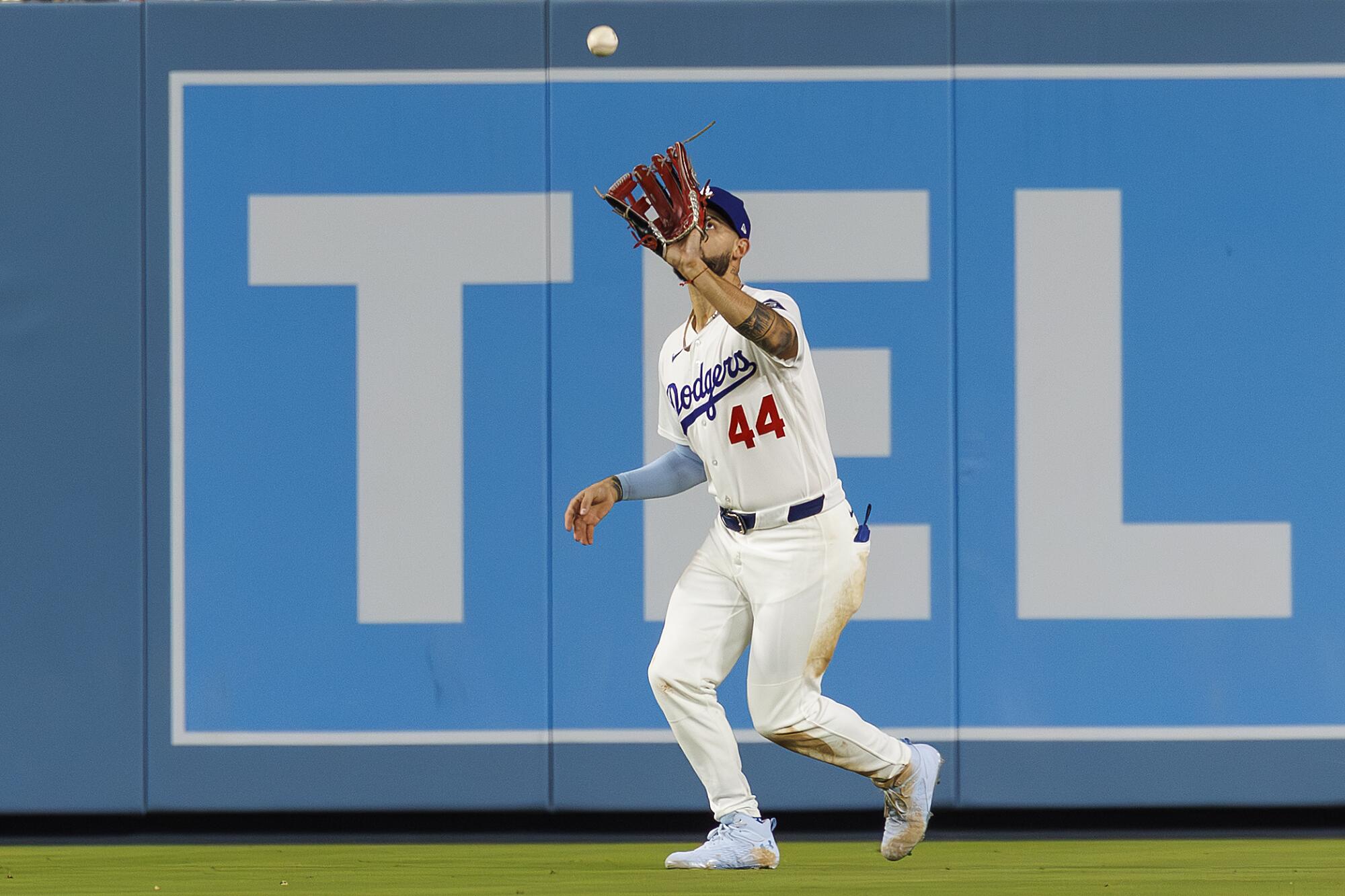 Dodgers center fielder Andy Pages makes a catch for the out during a game against the Colorado Rockies on May 26.