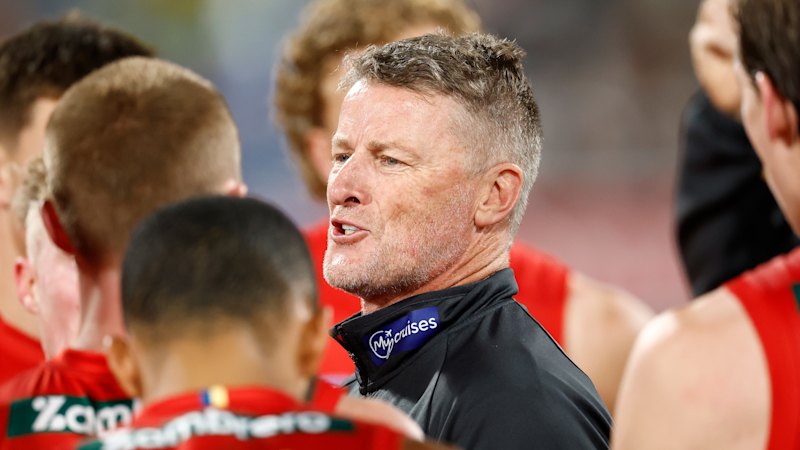 Damien Hardwick put on notice over umpire criticism by AFL, Gold Coast to be fined for fifth umpire contact offence; Greg Swann