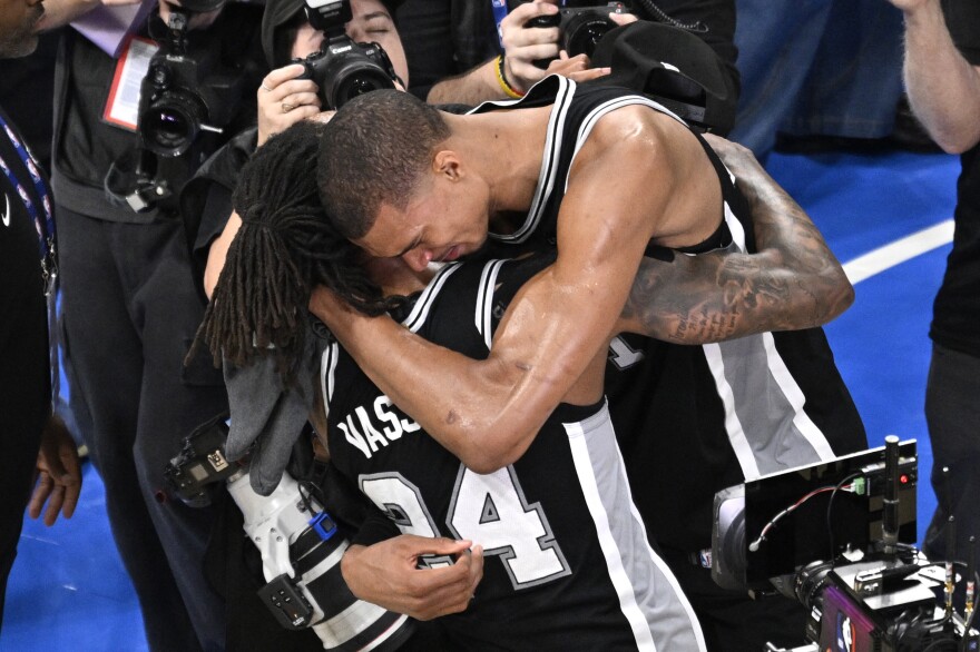 May 30, 2026; Oklahoma City, Oklahoma, USA; San Antonio Spurs forward Victor Wembanyama (1) celebrates with guard Devin Vassell (24) after defeating the Oklahoma City Thunder in game seven of the western conference finals for the 2026 NBA playoffs at Paycom Center.