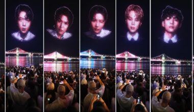 The faces of all seven BTS members light up the night sky during a special drone show commemorating the group’s Busan concert at Gwangalli Beach in Busan, Saturday. Yonhap