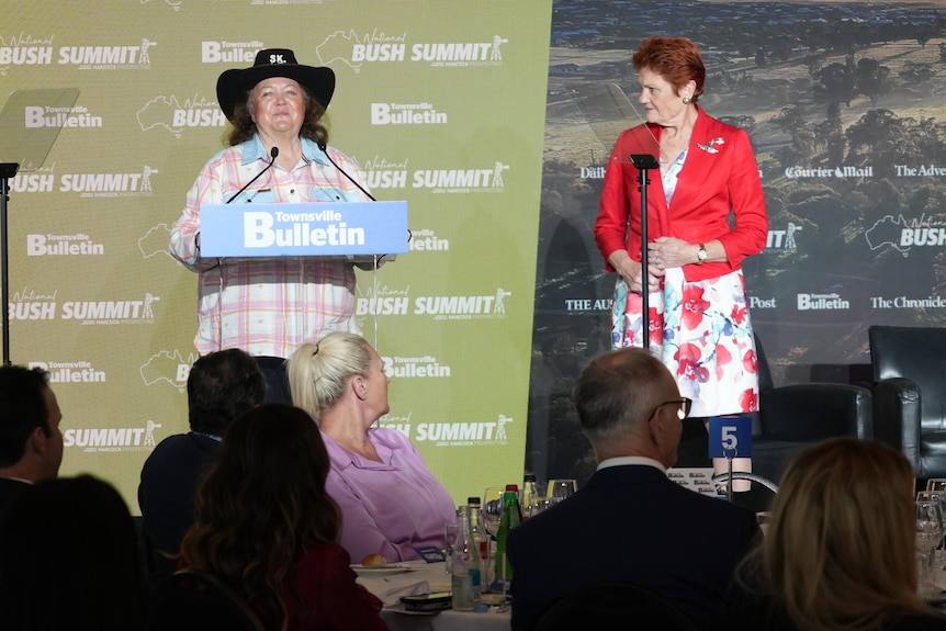 Gina Rinehart on a stage with Pauline Hanson.