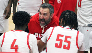 Alton boys basketball coach Dylan Dudley reacts during a timeout last season at AHS. Dudley is happy with the IHSA giving final approval to begin use of a 35-second shot clock for varsity boys and girls games beginning with the upcoming 2026-27 season. 