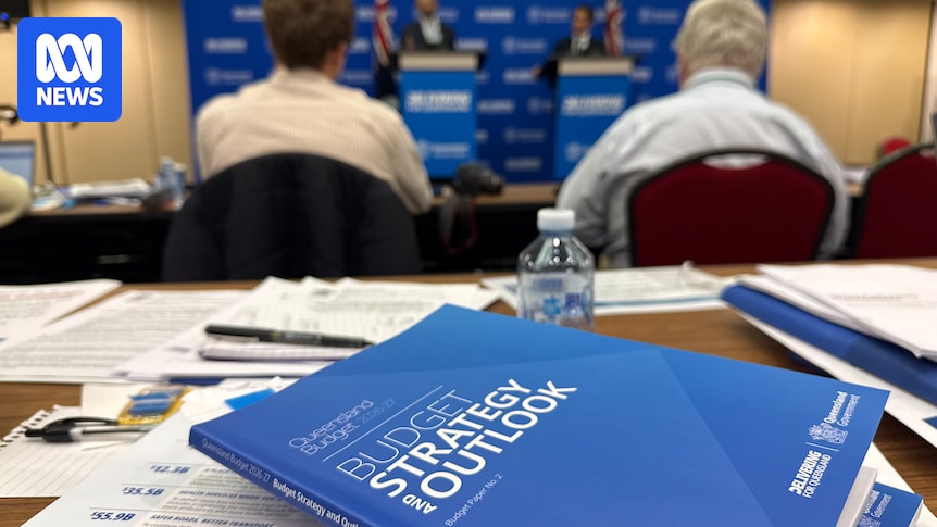 Queensland Treasurer David Janetzki hands down budget, targets return to surplus and cost-of-living relief