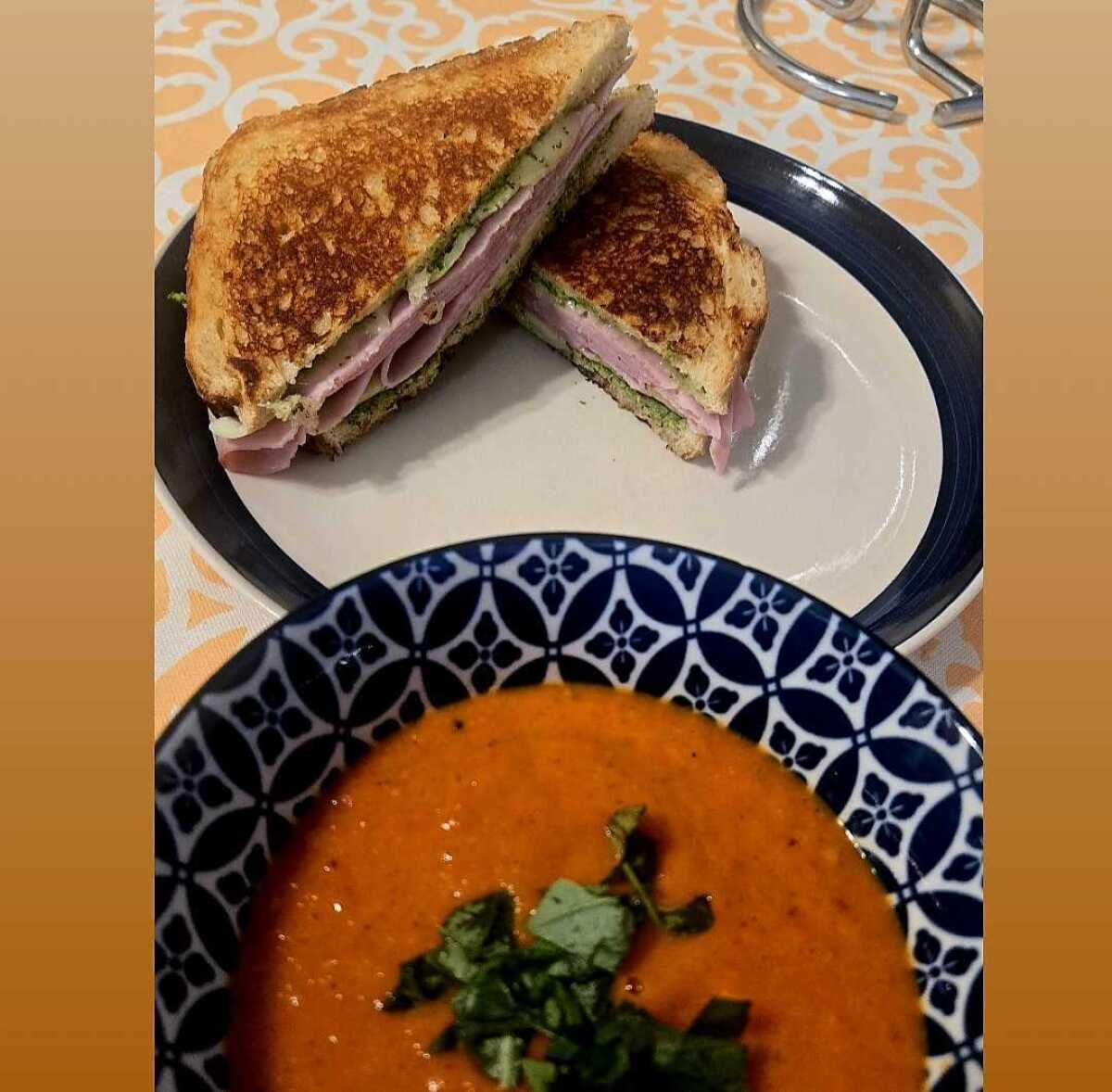 Pesto ham sandwich with roasted tomato soup.