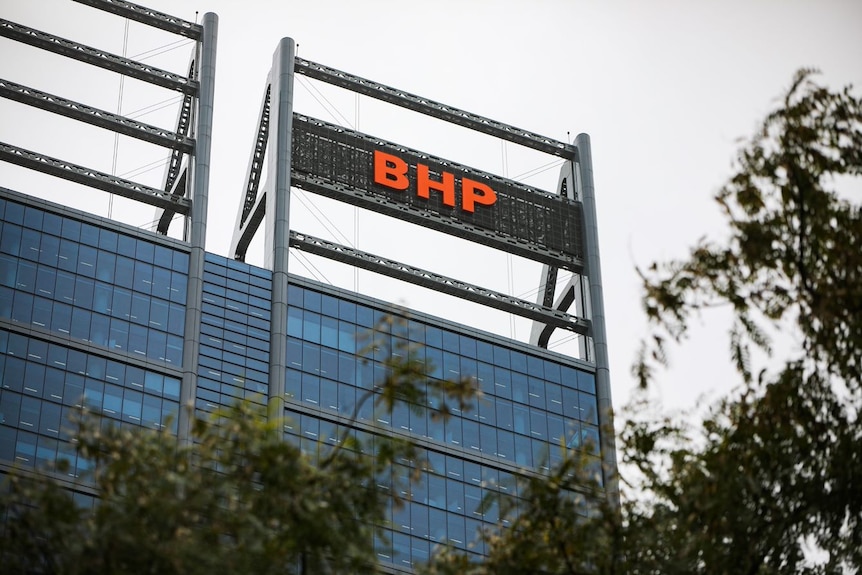 The BHP logo atop a large, modern-looking building.