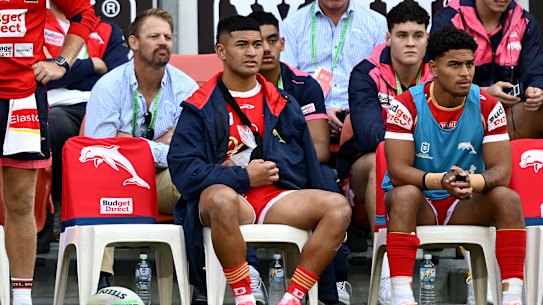 Isaiya Katoa sits with his arm in a sling.