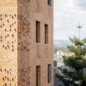 © Gaël Vande weghe Brick Tower Mixed Use Building / ASA Studio - Exterior Photography, Brick