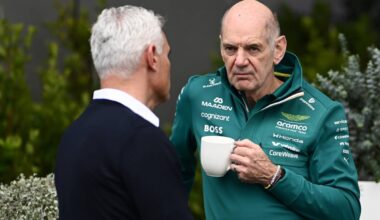 Adrian Newey scowling with a cup of coffee