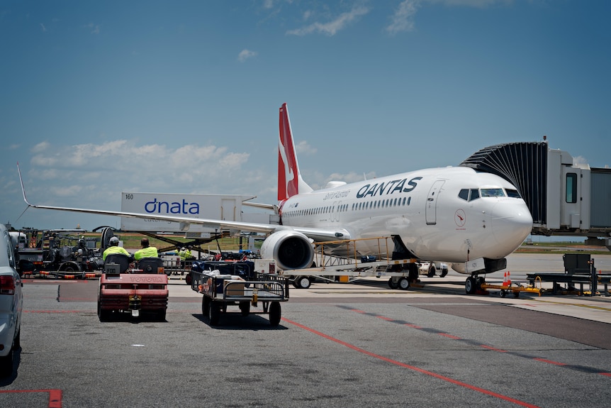 A Qantas plane on the tarmac.
