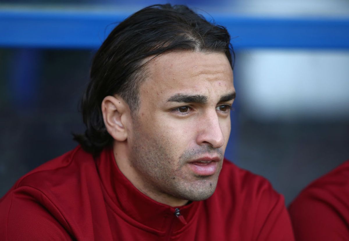 Lazar Markovic of Liverpool looks on from the bench during a pre-season friendly match between Tranmere Rovers and Liverpool at Prenton Park
